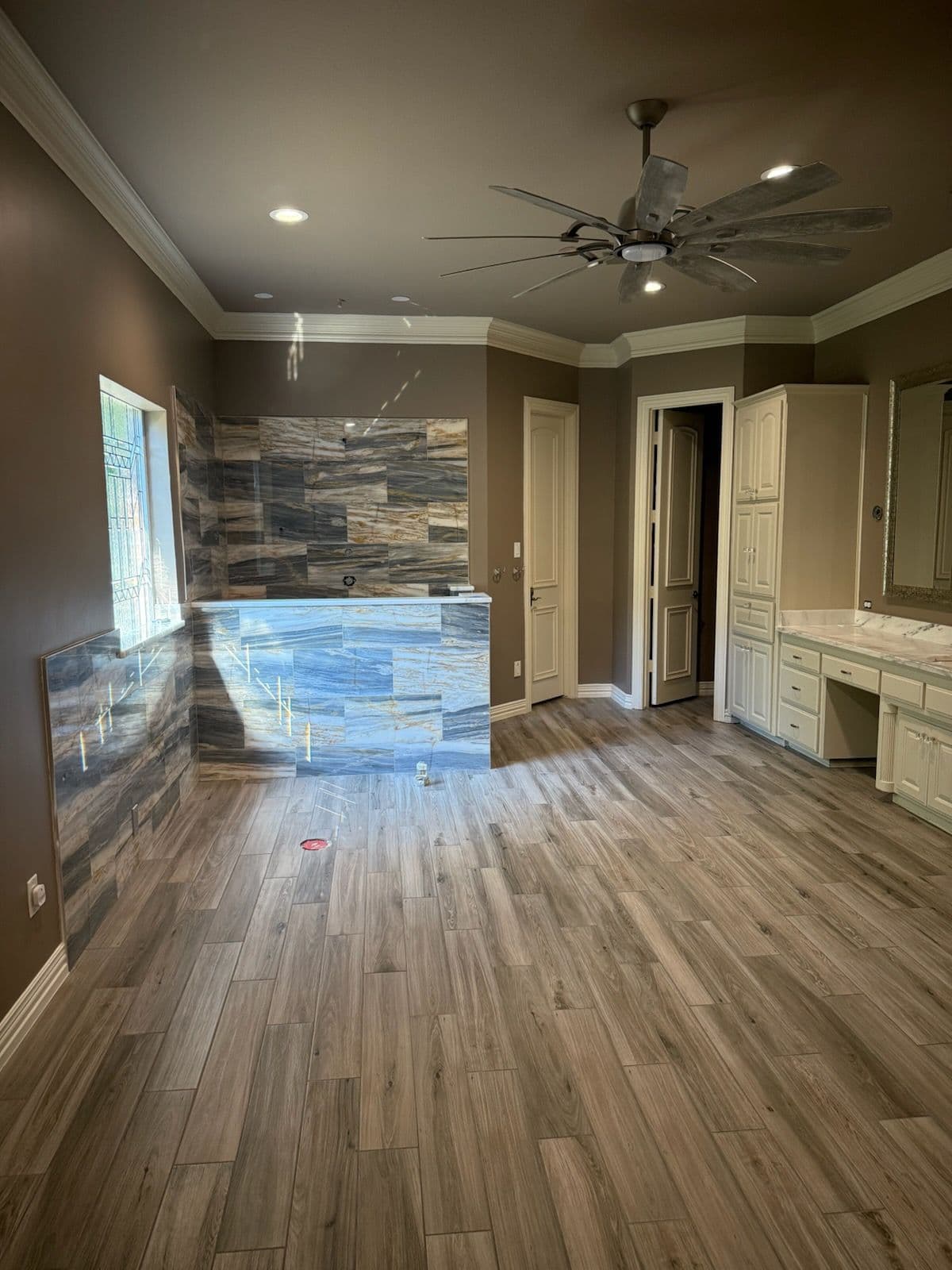 Elegant Bathroom Refresh with Wood-Style Tiles image