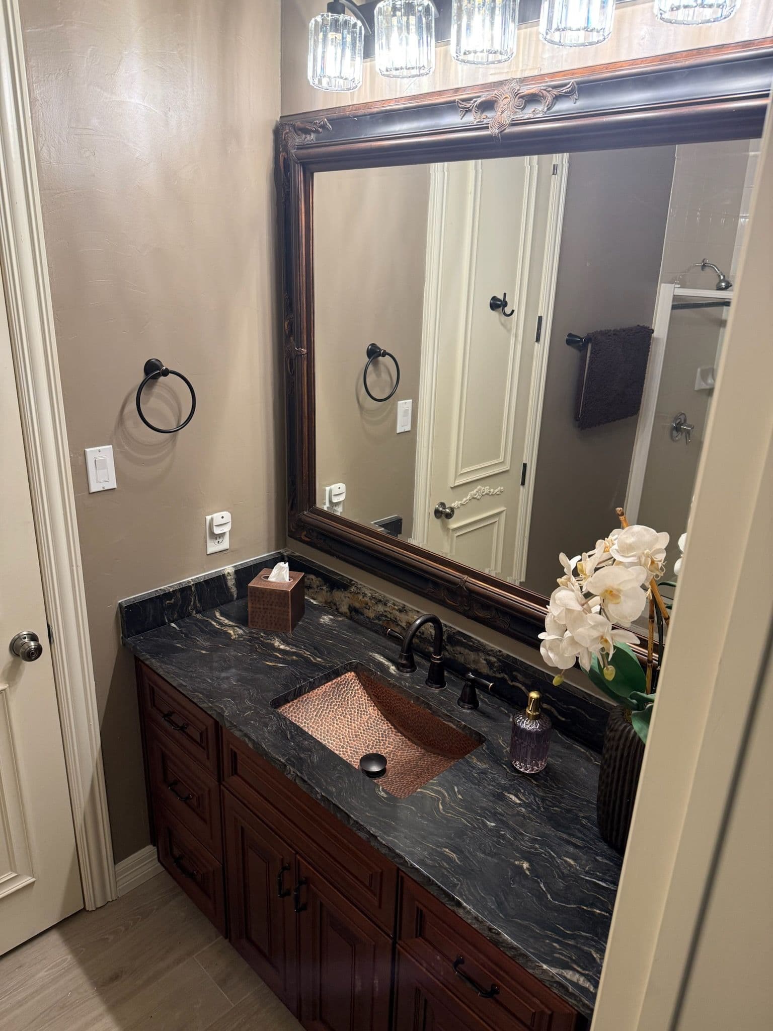 Elegant Hall Bath Makeover with Unique Touches image
